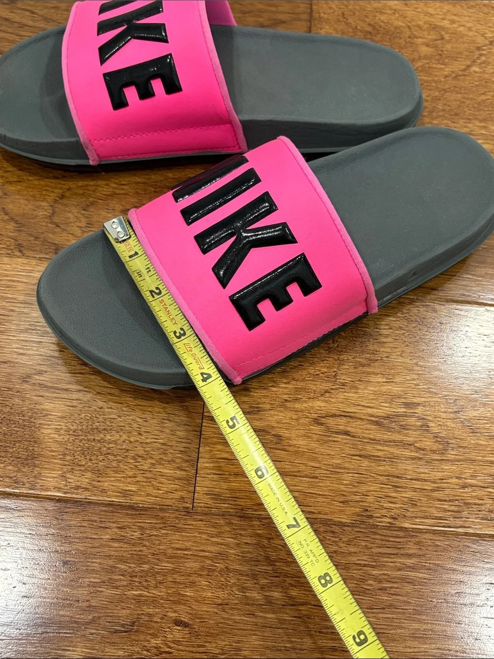 Nike Women’s Pink and Gray Slide Sandals with Bold Logo